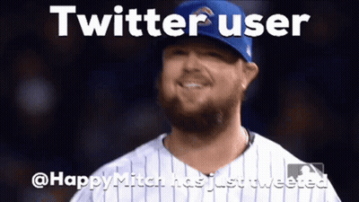 A Man With A Beard Is Wearing A Blue Hat And Smiling With The Words Twitter User GIF