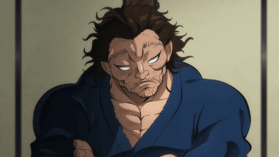 A Man With A Beard Is Wearing A Blue Kimono GIF
