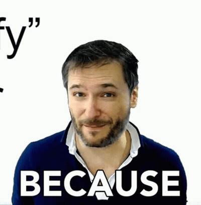 A Man With A Beard Is Wearing A Blue Shirt That Says " Because " On It GIF