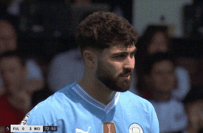 A Man With A Beard Is Wearing A Blue Shirt That Says Ful 0 3 Mci 72:50 GIF