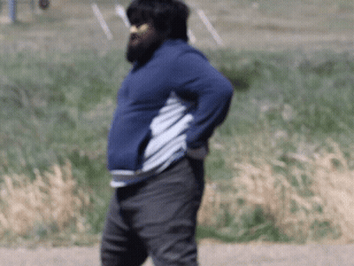 A Man With A Beard Is Wearing A Blue Sweatshirt GIF