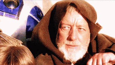 A Man With A Beard Is Wearing A Brown Robe GIF