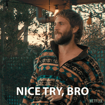 A Man With A Beard Is Wearing A Colorful Jacket And Says Nice Try Bro GIF