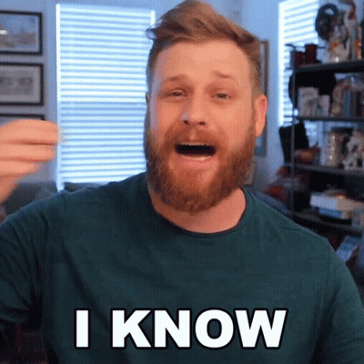 A Man With A Beard Is Wearing A Green Shirt And Says I Know GIF