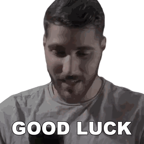 A Man With A Beard Is Wearing A Grey Shirt And Says Good Luck Sticker