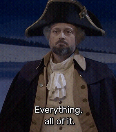 A Man With A Beard Is Wearing A Hat And A Coat And Says Everything All Of It GIF