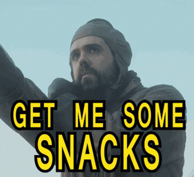 A Man With A Beard Is Wearing A Hat And A Jacket And Says Get Me Some Snacks GIF