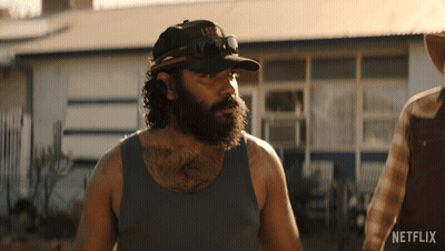 A Man With A Beard Is Wearing A Hat That Says Life GIF