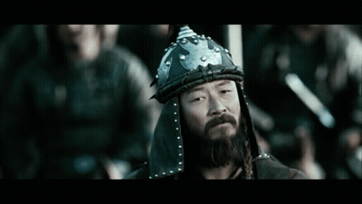 A Man With A Beard Is Wearing A Helmet GIF