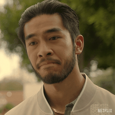 A Man With A Beard Is Wearing A Jacket That Says Netflix GIF