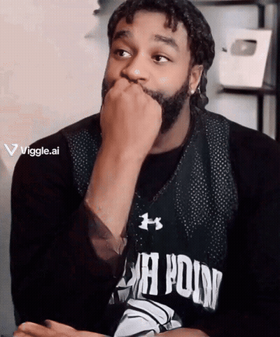 A Man With A Beard Is Wearing A Jersey That Says ' Jh Point ' On It GIF