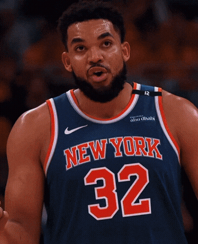 A Man With A Beard Is Wearing A Jersey That Says New York 32 GIF