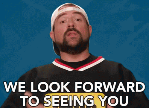 A Man With A Beard Is Wearing A Jersey That Says " We Look Forward To Seeing You " GIF