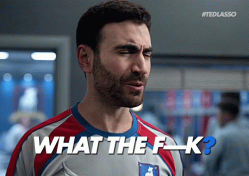 A Man With A Beard Is Wearing A Jersey That Says What The F-K GIF