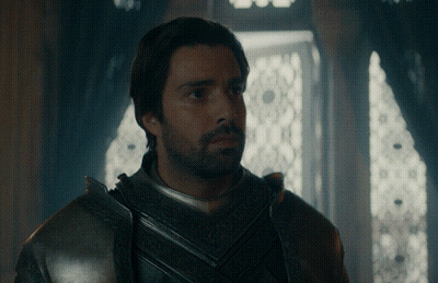 A Man With A Beard Is Wearing A Knight 'S Armor GIF