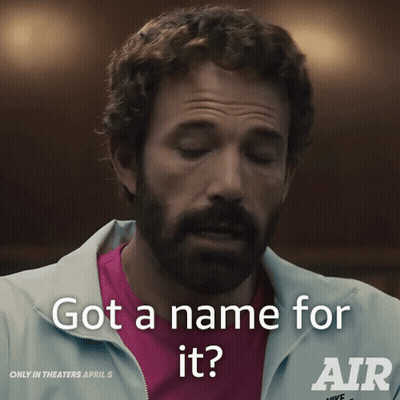 A Man With A Beard Is Wearing A Nike Jacket GIF
