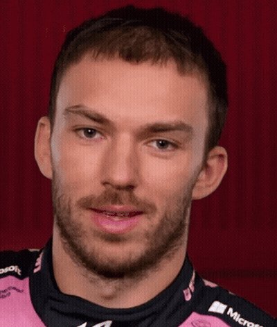 A Man With A Beard Is Wearing A Pink Shirt That Says Microsoft On It GIF