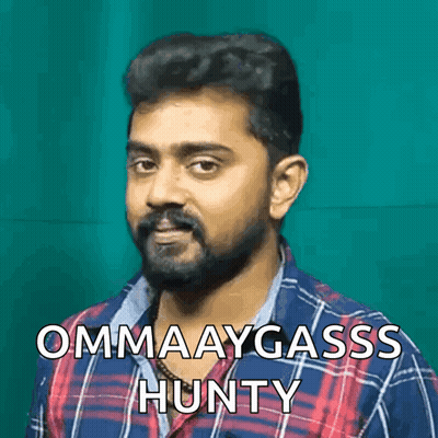 A Man With A Beard Is Wearing A Plaid Shirt And Says Ommaaygass Hunty GIF