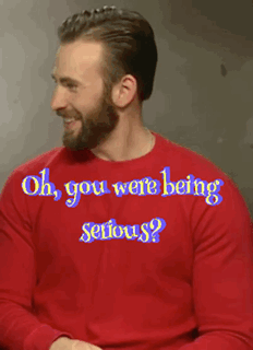 A Man With A Beard Is Wearing A Red Shirt That Says " Oh You Were Being Serious " GIF