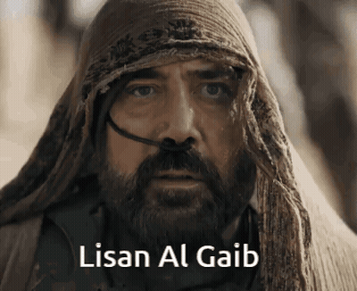 A Man With A Beard Is Wearing A Scarf Around His Head And Says Lisan Al Gaib On The Bottom GIF
