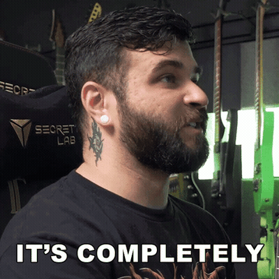 A Man With A Beard Is Wearing A Secret Lab Chair GIF