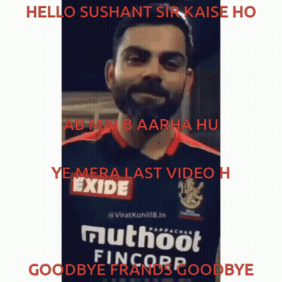 A Man With A Beard Is Wearing A Shirt That Says Exide On It GIF