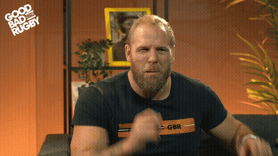 A Man With A Beard Is Wearing A Shirt That Says Gbr On It GIF