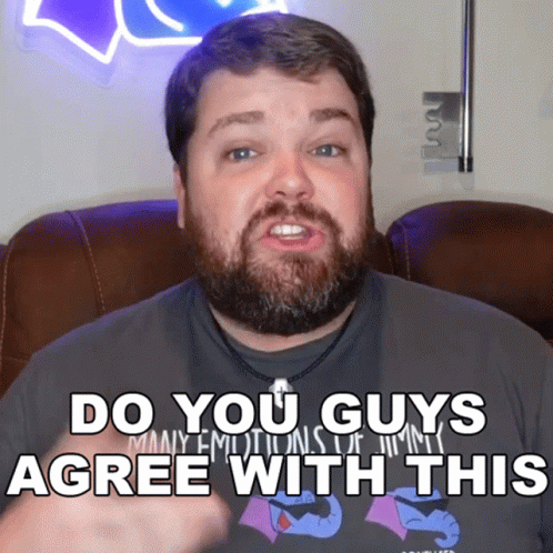 A Man With A Beard Is Wearing A Shirt That Says Many Emotions GIF