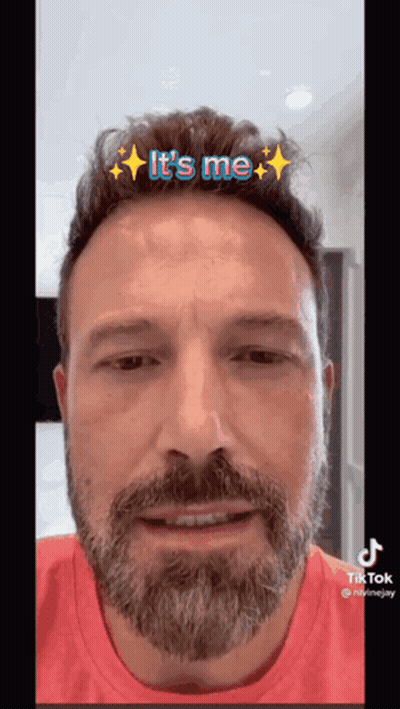 A Man With A Beard Is Wearing A Tiktok Filter That Says It 'S Me . GIF