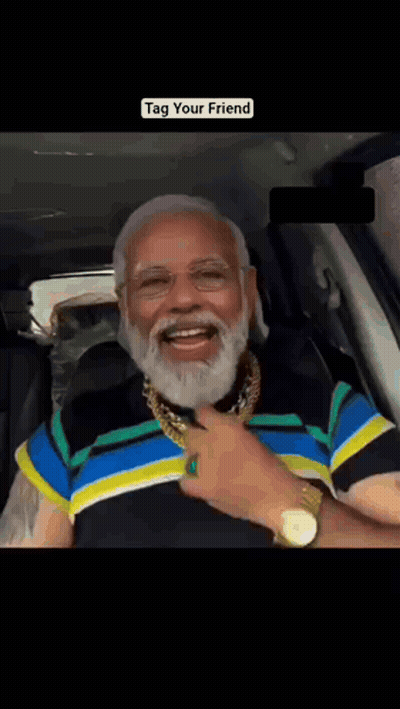 A Man With A Beard Is Wearing A Watch And A Gold Chain Around His Neck GIF