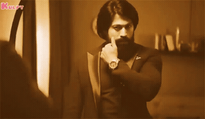 A Man With A Beard Is Wearing A Watch And Has The Word Kulfy Written On The Bottom Right GIF