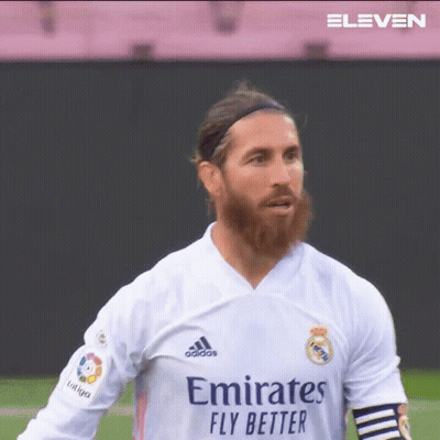 A Man With A Beard Is Wearing A White Emirates Fly Better Jersey GIF