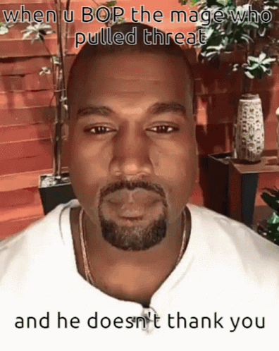 A Man With A Beard Is Wearing A White Shirt And A Necklace . GIF