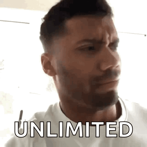 A Man With A Beard Is Wearing A White Shirt And The Word Unlimited Is On His Face GIF