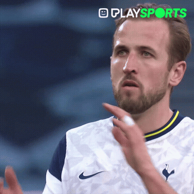 A Man With A Beard Is Wearing A White Shirt That Says Nike On It GIF