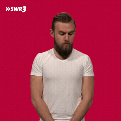 A Man With A Beard Is Wearing A White T-Shirt With Swr3 In White Letters GIF