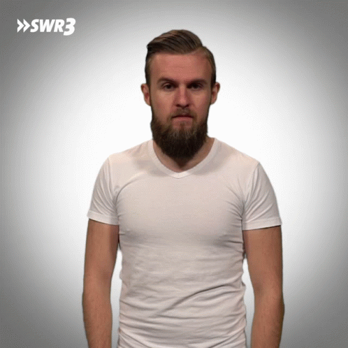 A Man With A Beard Is Wearing A White T-Shirt With The Letters Swr3 On The Bottom GIF