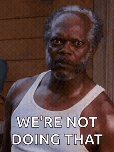 A Man With A Beard Is Wearing A White Tank Top And Saying `` We 'Re Not Doing That '' GIF