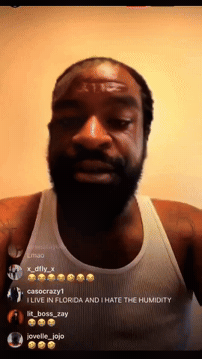 A Man With A Beard Is Wearing A White Tank Top And Says " I Live In Florida " GIF