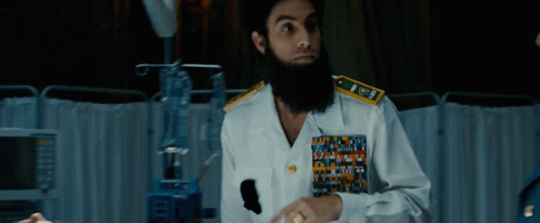 Bearded Man In Navy Uniform With US Navy Badge GIF