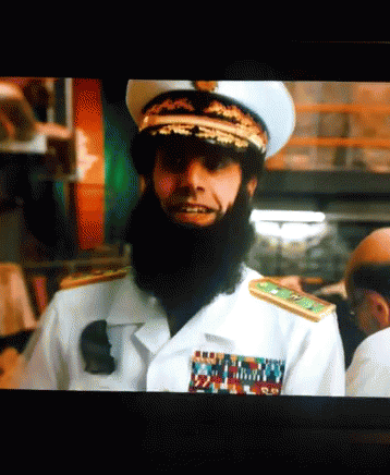 Bearded Man In White Uniform With Gold Hat GIF