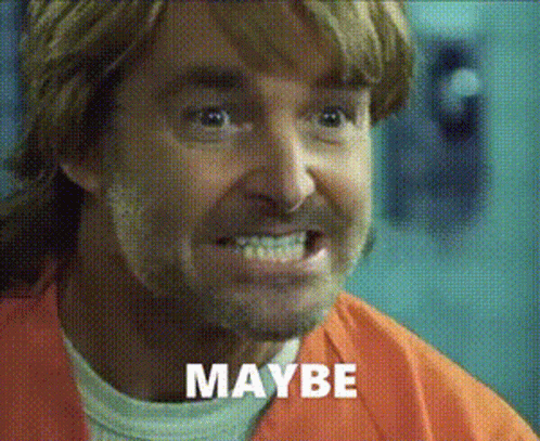 A Man With A Beard Is Wearing An Orange Prison Uniform And The Word Maybe Is On His Face GIF
