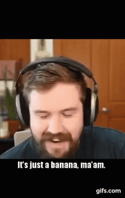 A Man With A Beard Is Wearing Headphones And Saying It 'S Just A Banana , Ma Am . GIF