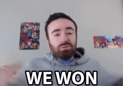 A Man With A Beard Is Wearing Headphones And Says `` We Won '' While Looking At The Camera . GIF
