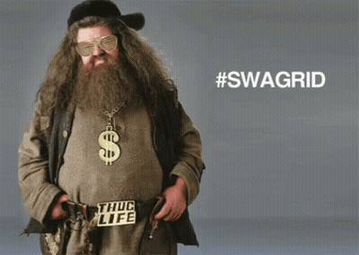 A Man With A Beard Is Wearing Sunglasses And A Dollar Sign Necklace GIF