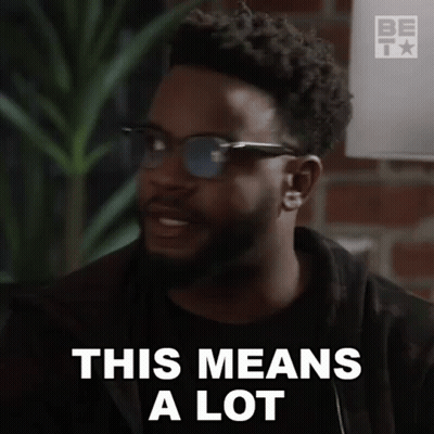 A Man With A Beard Is Wearing Sunglasses And Says This Means A Lot . GIF