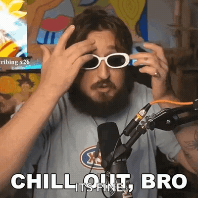 A Man With A Beard Is Wearing Sunglasses In Front Of A Microphone And Says Chill Out Bro GIF