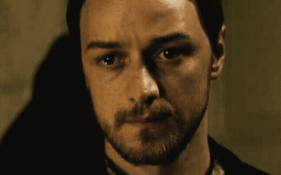 A Man With A Beard Looks At The Camera With His Eyes Closed GIF