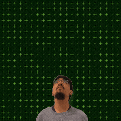 A Man With A Beard Looks Up At The Number 16 GIF