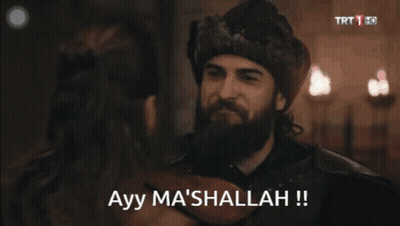 A Man With A Beard Says Ayy Ma 'Sallah On A Screen GIF